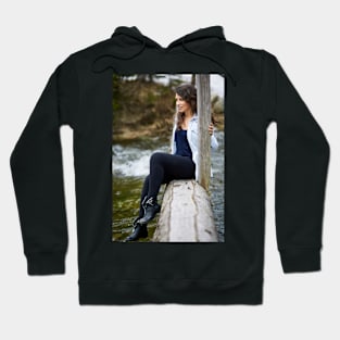 Woman tourist on a wooden bridge Hoodie